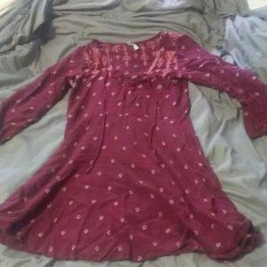 Cute short dress with criss cross tie at chest.